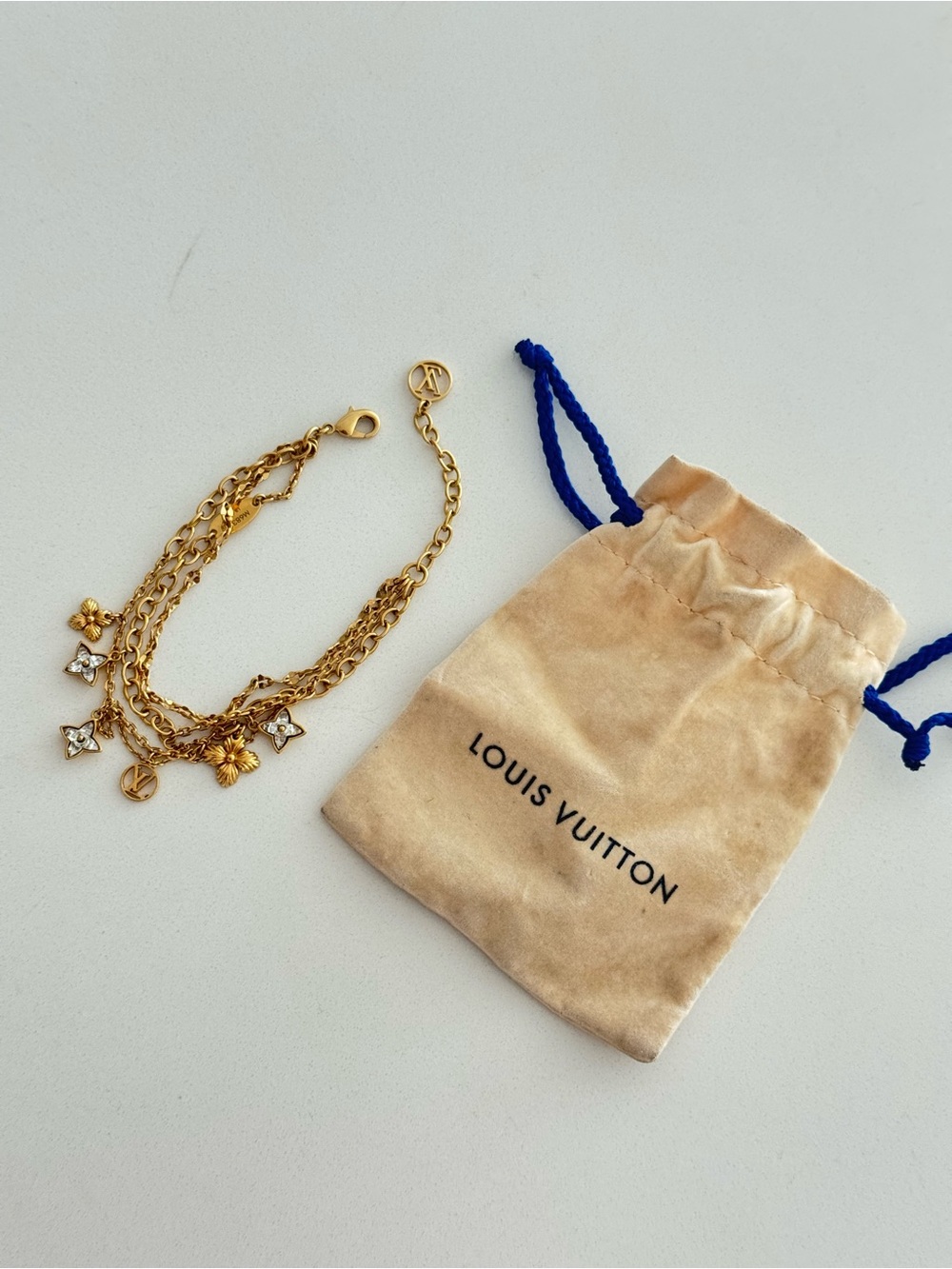 Louis Vuitton Gold Multichain Charm Bracelet with White Crystal Accents